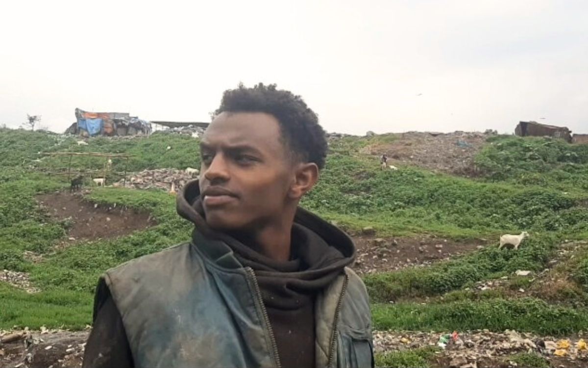 Mulualem Mulualem near the dumpsite in the capital city of Ethiopia.