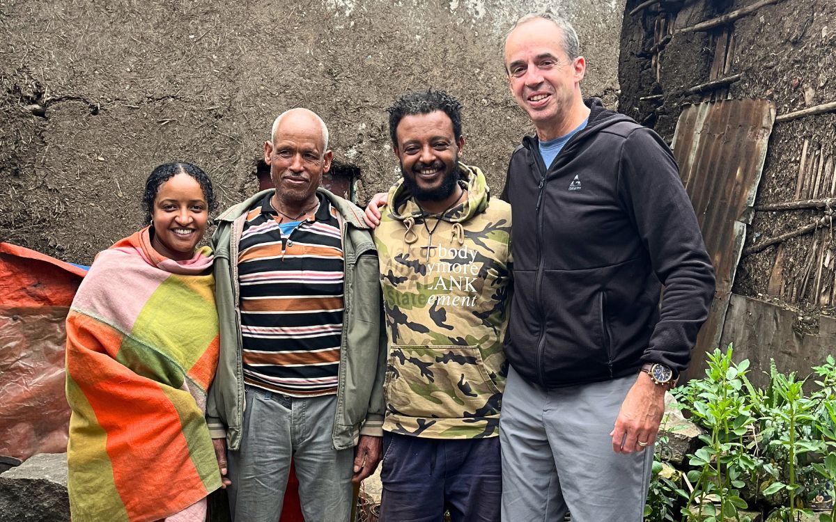 Mike with team leader and community members in Ethiopia