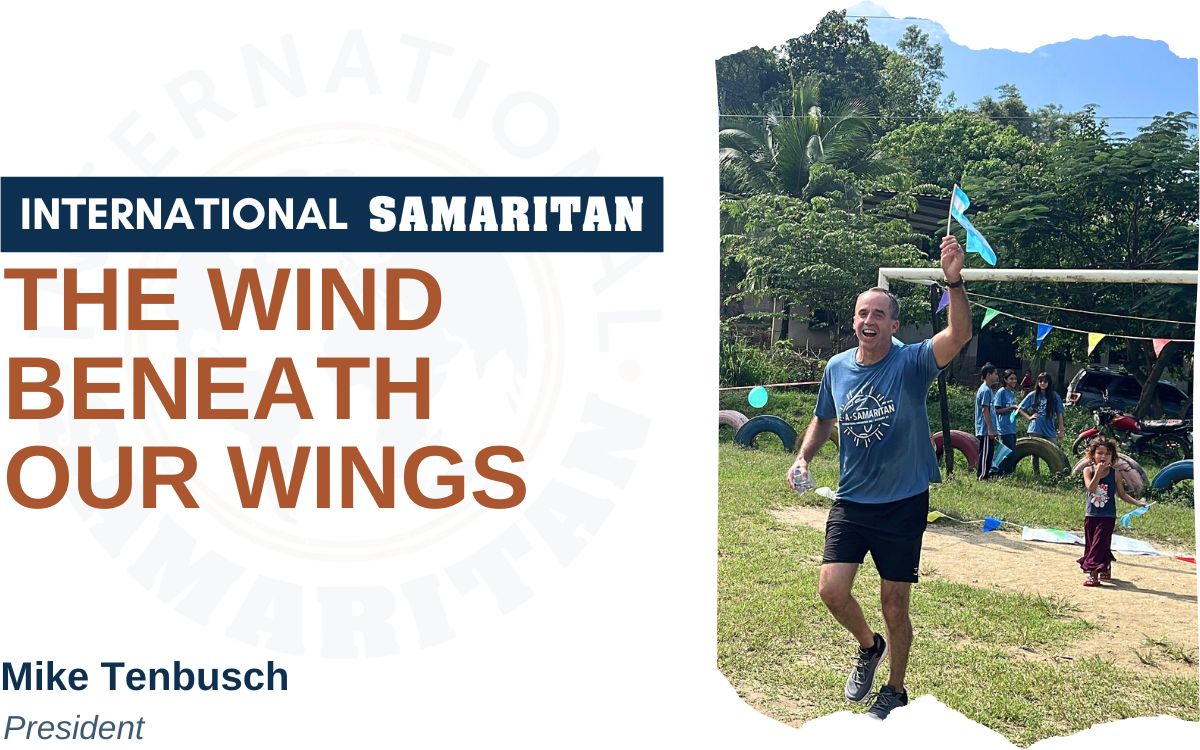 Vision Worth Fighting For The Wind Beneath Our Wings by Mike with a photo of him running in a 5K.