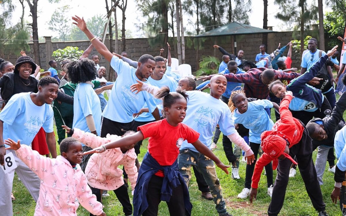 scholars stretching in Kenya before the 5K