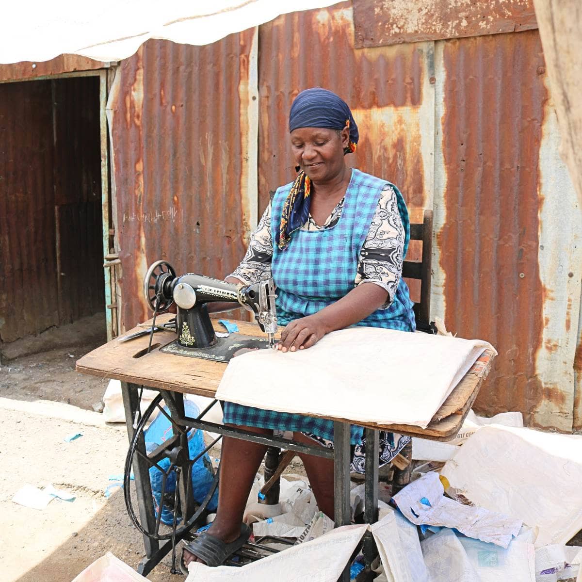 3 A mother in Kenya started her own sewing business.