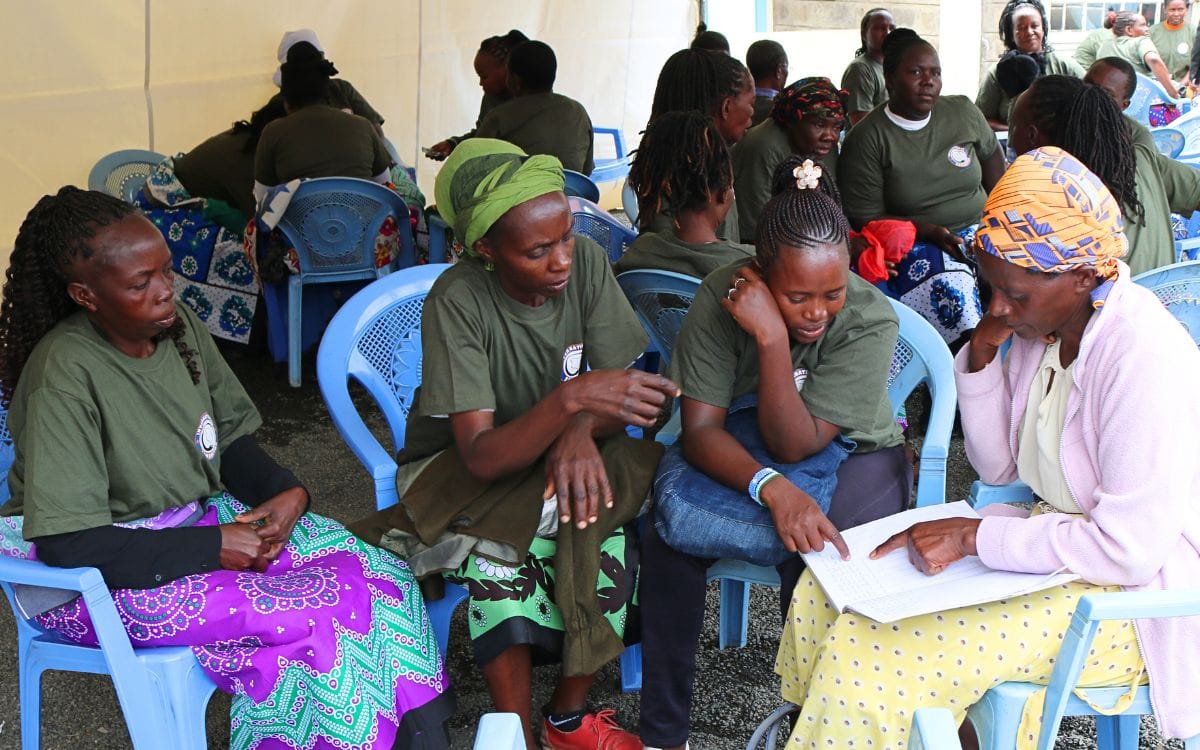 Savings groups meet regularly at International Samaritan Kenya as parents of our scholarship students plan their small businesses and record how much they've earned and saved.